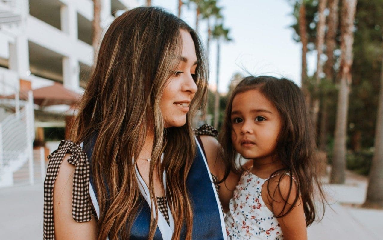 woman holding a child